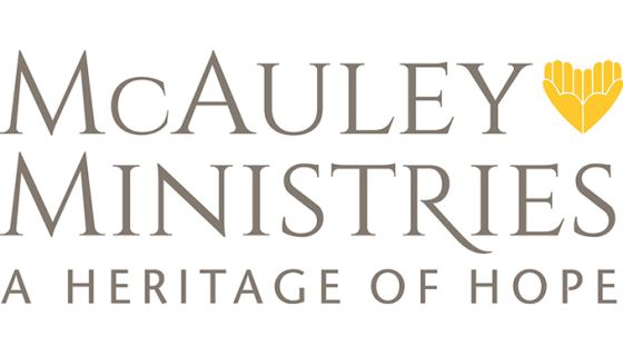 McAuley Ministries, a heritage of hope logo, with a yellow figure of hands shaped into a heart